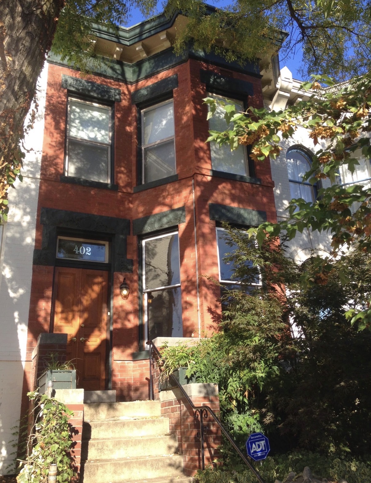 Front facade of the brick rowhouse at 402